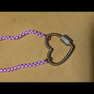 Melania Clara necklace. Pink enamel and heart caribeaner